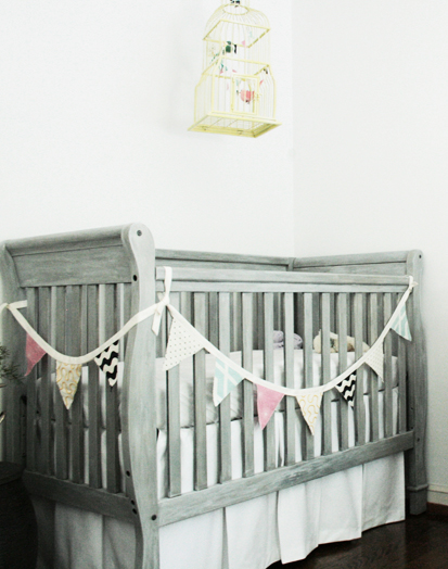 white washed baby crib